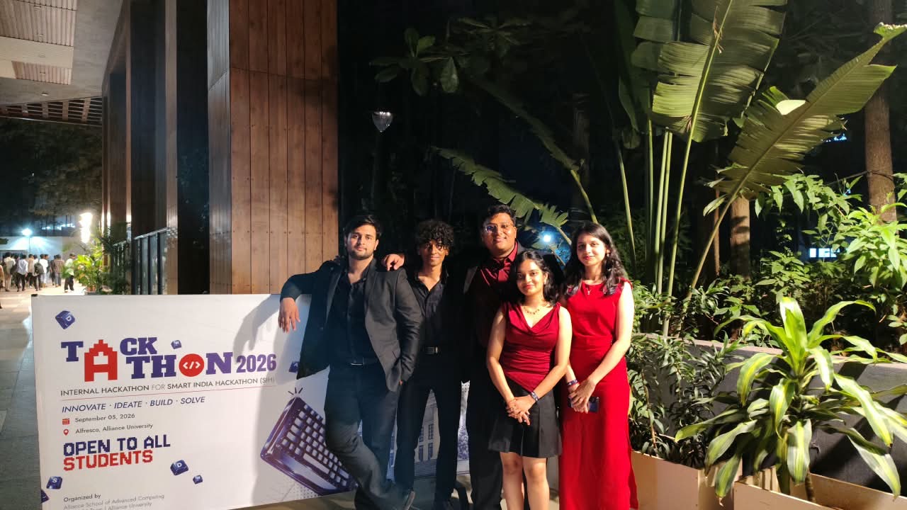 Five friends in black and red at a hackathon evening